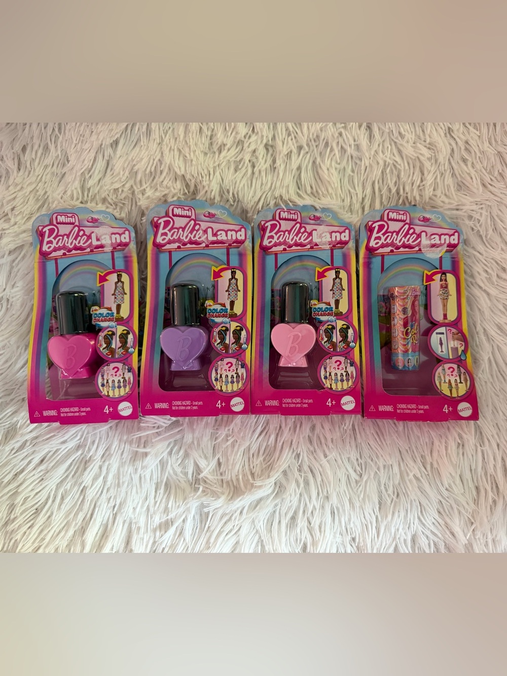 4 new mini Barbie land dolls